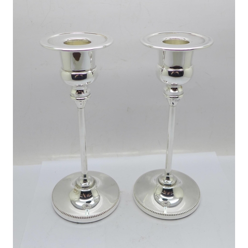 888 - A pair of Arthur Price silver plated candlesticks, boxed