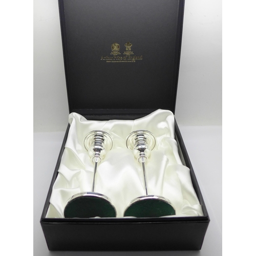 888 - A pair of Arthur Price silver plated candlesticks, boxed