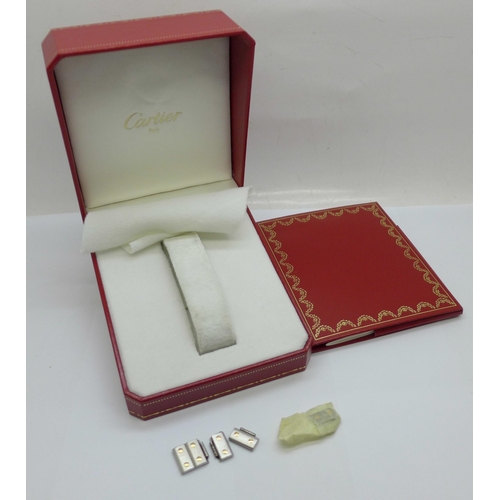 896 - A Cartier wristwatch box, outer box and spare links