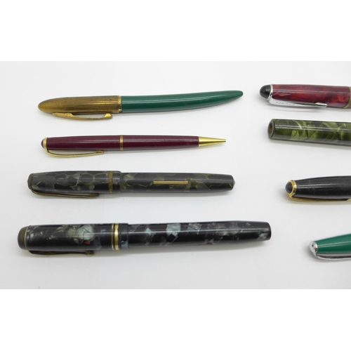 897 - Two pens with 14ct gold nibs, The Conway Stewart and Burnham No.51, five other pens and a pencil, a/... 