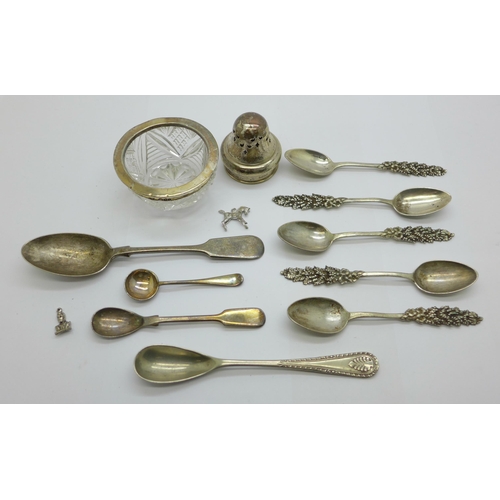 902 - A silver rimmed glass salt, a set of five white metal spoons, four plated spoons, etc.