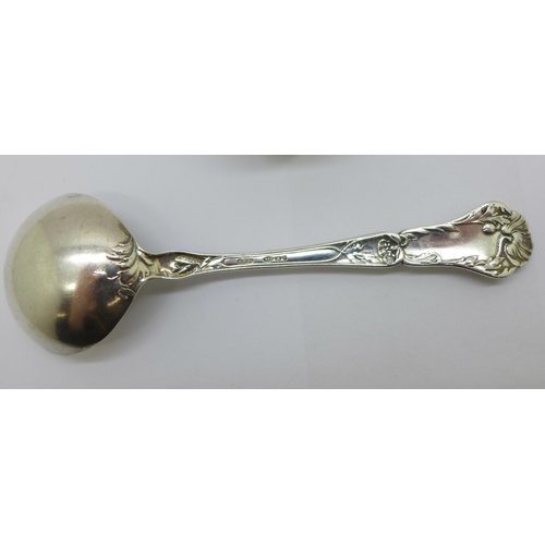 905 - A silver topped glass pot and a silver spoon with import mark, 26g of silver