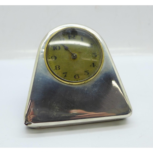 913 - A silver cased clock, Birmingham 1925, (case a/f at bottom front corners)