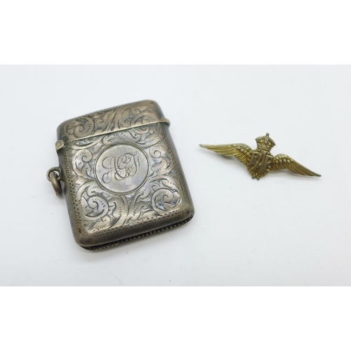 917 - A silver vesta case, a/f, and a silver RAF brooch