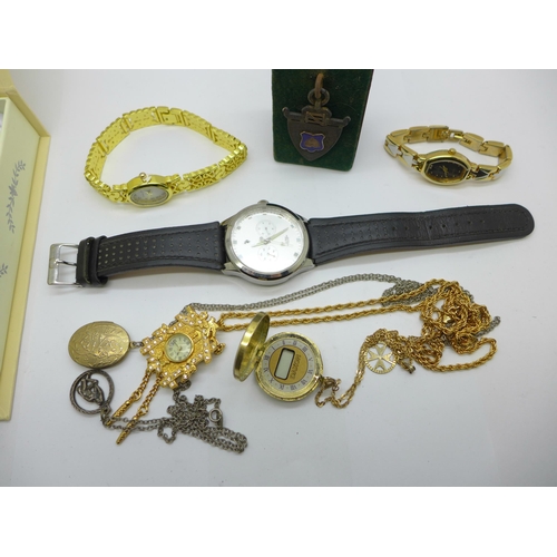 922 - Watches including Charles Leman, a locket and chain, collector's spoon and a silver medal mounted on... 