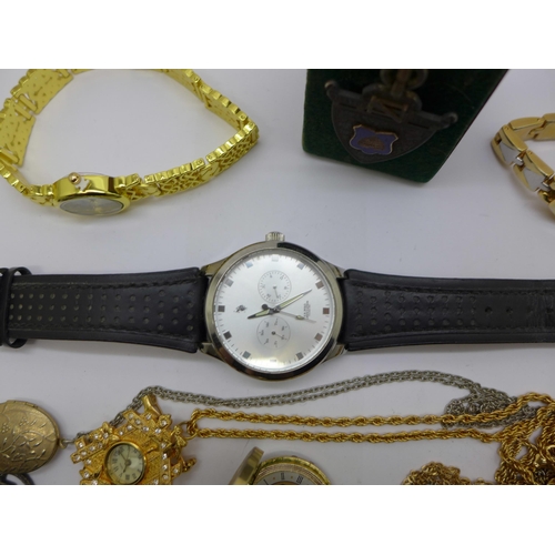 922 - Watches including Charles Leman, a locket and chain, collector's spoon and a silver medal mounted on... 