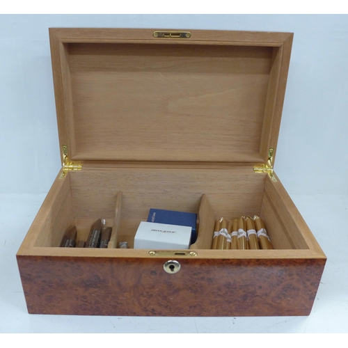 945 - A Humidor with a collection of cigars, ten Villiger Premium No3, three Cigarworld, two Villiger Expo... 