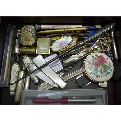 947 - A wooden box with contents, penknives, pens, an Acme City whistle, etc.