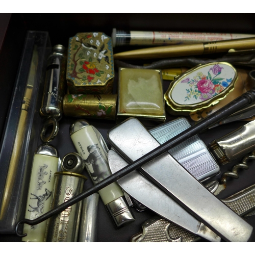 947 - A wooden box with contents, penknives, pens, an Acme City whistle, etc.