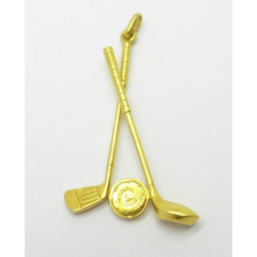 954 - An 18ct gold golf pendant, 4.2g