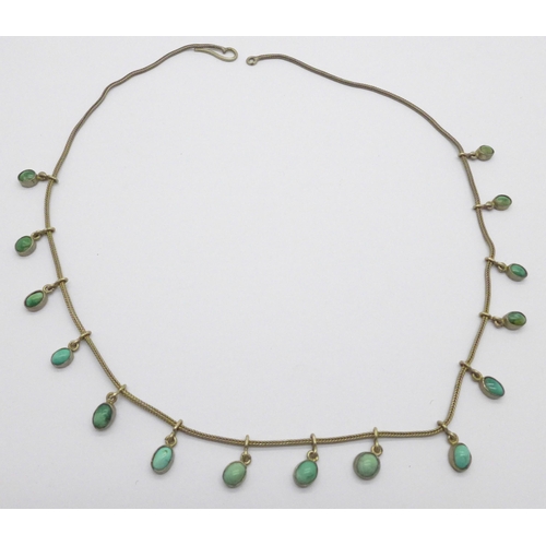 977 - A white metal and turquoise fringe necklace