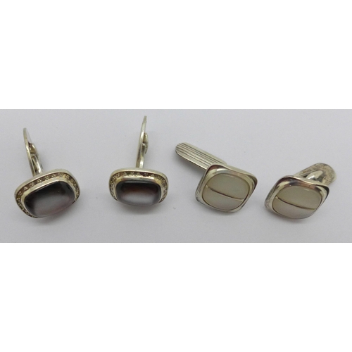 989 - Two pairs of silver cufflinks, 800 and 835