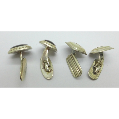 989 - Two pairs of silver cufflinks, 800 and 835