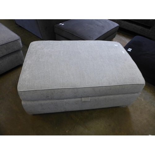 1522 - A grey upholstered storage footstool