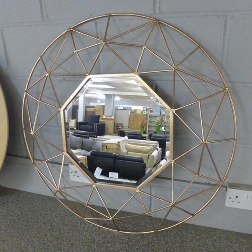 1524 - A copper framed octagonal mirror * this lot is subject to VAT 90cm diameter