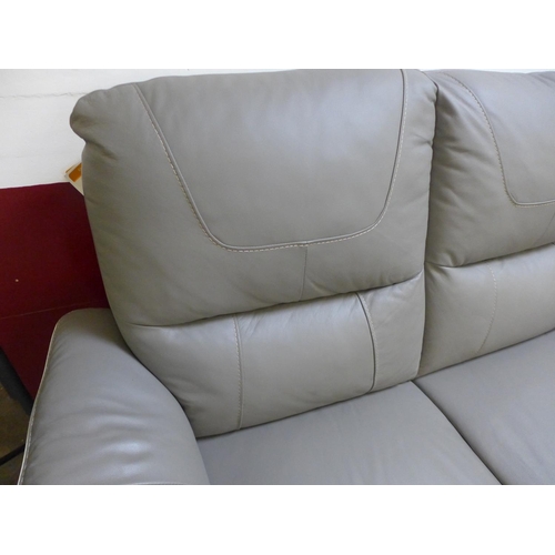 1545 - A Raffa grey leather two seater sofa