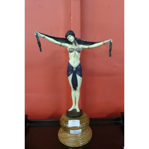 10 - An Art Deco style painted bronze figure of an exotic female dancer, on marble socle