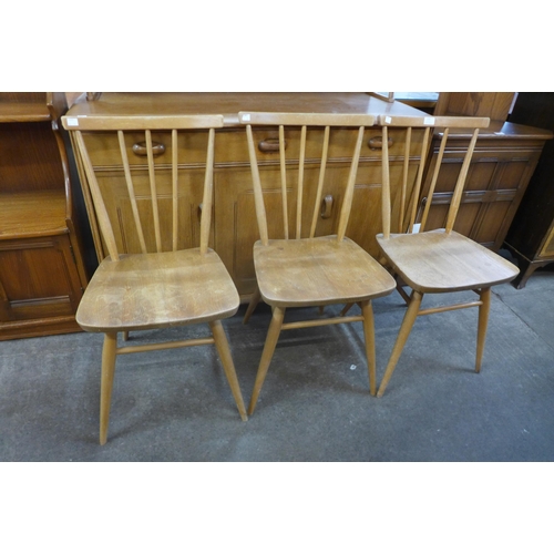 110 - A set of three Ercol elm and beech 608 model chairs