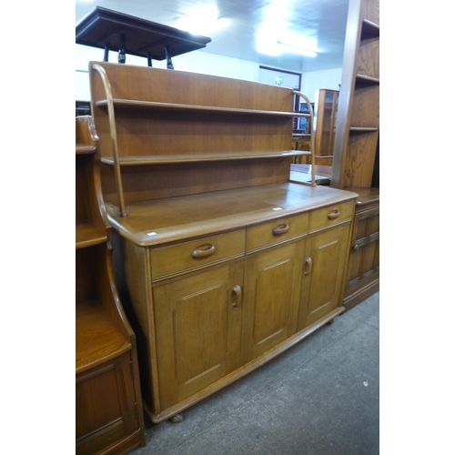 113 - A Priory oak sideboard