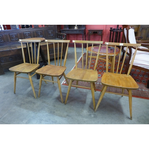 123 - A set of four Ercol Blonde elm and beech 391 model chairs