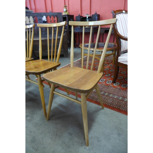 124 - A set of four Ercol Blonde elm and beech 391 model chairs