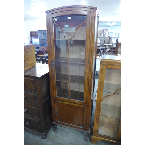 135 - A carved oak bookcase