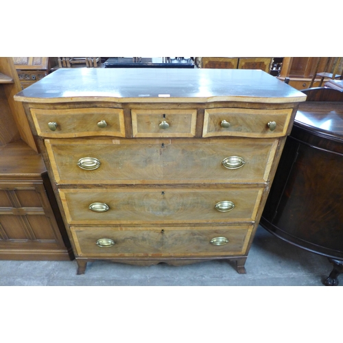 138 - A 19th Century continental inlaid walnut chest of drawers