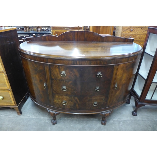 139 - An early 20th Century Waring & Gillows mahogany demi-lune sideboard