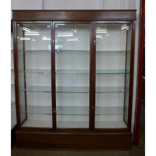 143 - A large mahogany three door shop display cabinet, 215cms h, 185cms w, 38cms d