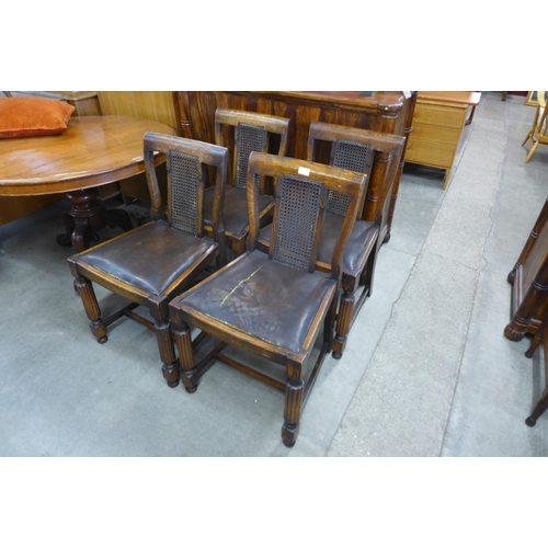 158 - A set of four oak bergere dining chairs