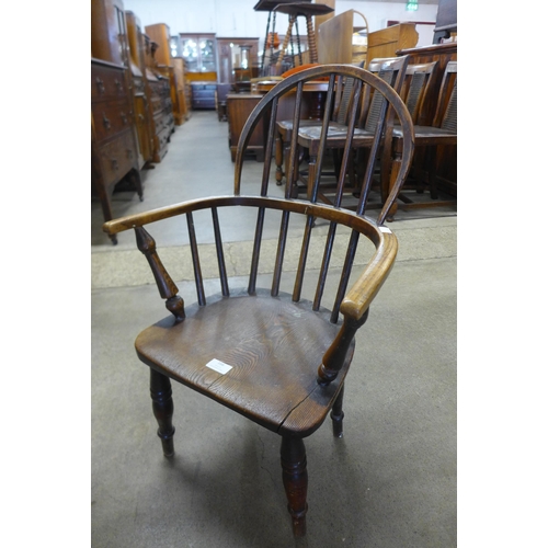 166 - A Victorian child's elm Windsor armchair