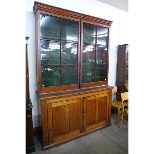 198 - A large Victorian pine country house gun cabinet