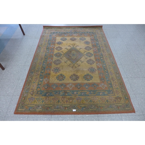 211 - A green ground rug