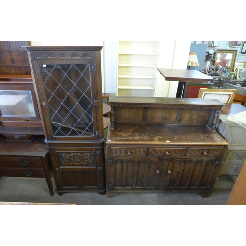 222 - A carved oak court cupboard and a carved oak freestanding corner cabinet