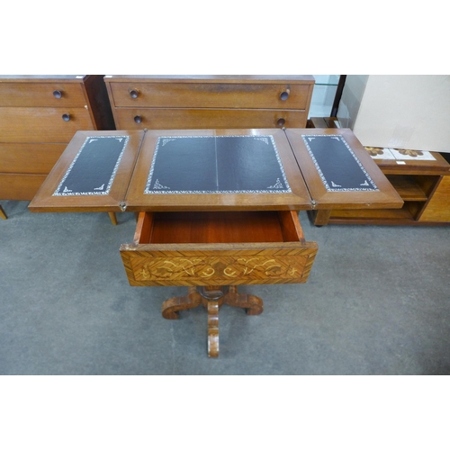 27 - An Italian style rosewood and marquetry inlaid fold over single drawer writing table