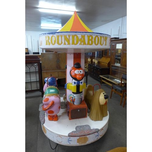 274 - A late 20th Century coin operated child's The Magic Roundabout ride