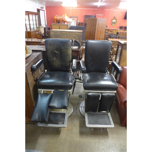 275 - A pair of vintage barber's chairs