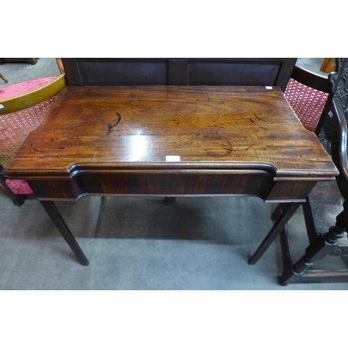 35 - A George III mahogany rectangular fold over card table