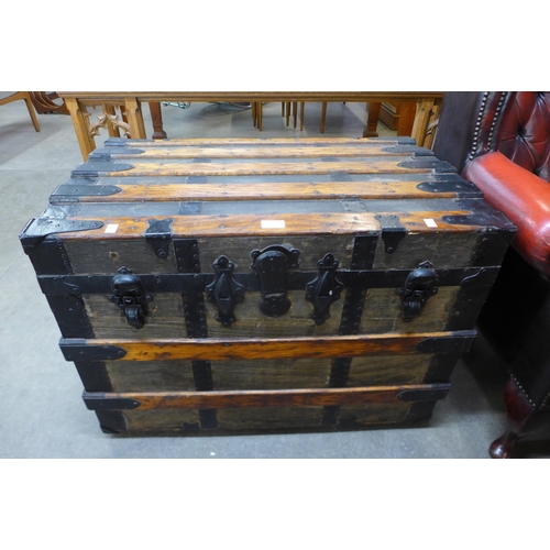 36 - A 19th Century beech and iron mounted steamer trunk