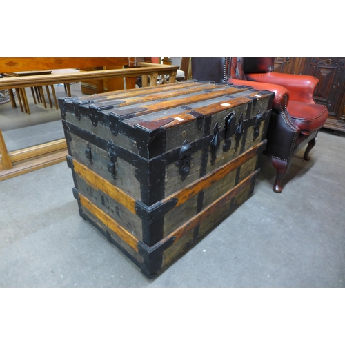 36 - A 19th Century beech and iron mounted steamer trunk