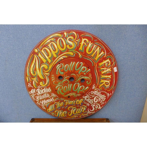 369 - A painted wooden fairground sign, Zippos Fun Fair