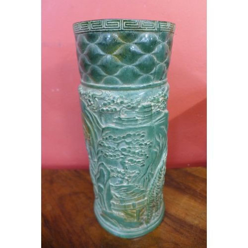 41 - An oriental carved green hardstone brush pot