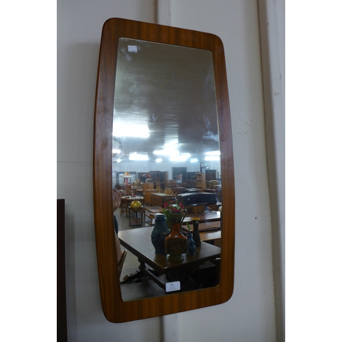 54 - A teak framed mirror