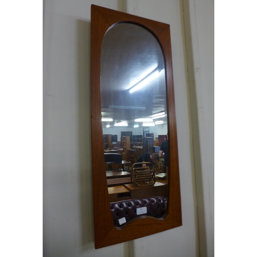 57 - A teak framed mirror