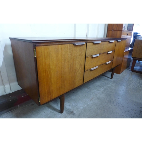 61 - A teak sideboard