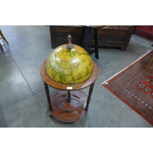 70 - A terrestrial globe cocktail cabinet/trolley