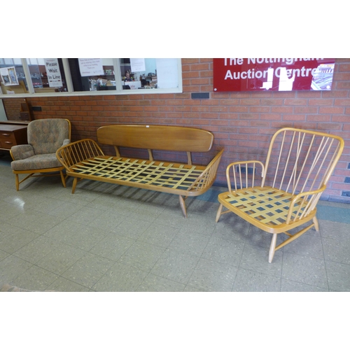 76 - An Ercol Blonde elm and beech 355 model studio couch and pair of matching armchairs