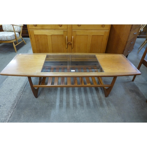 80 - A G-Plan Fresco teak and glass topped coffee table