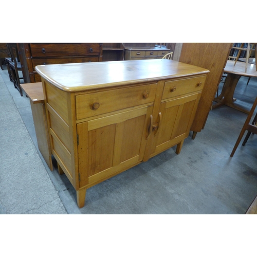 81 - An Ercol Blonde elm and beech sideboard