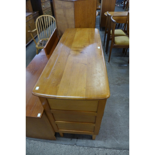 81 - An Ercol Blonde elm and beech sideboard